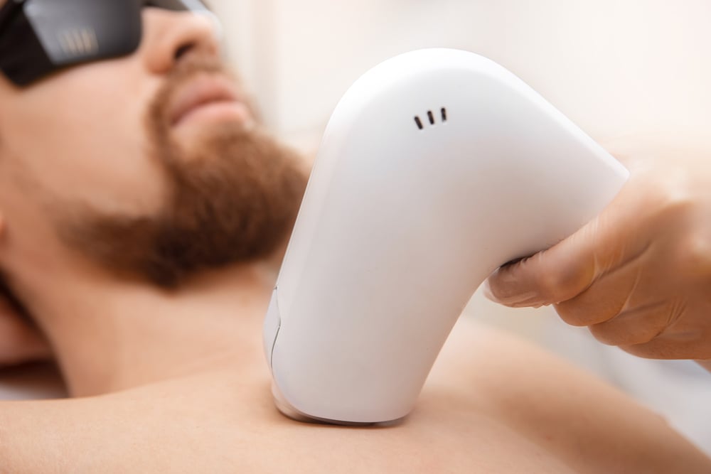 Patient receiving laser hair removal service at CFR Aesthetics